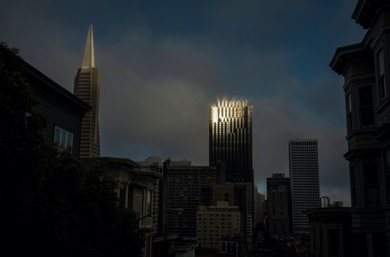 Sunlight is reflected on the building at 555 California Street, center right, in San Francisco, California, U.S., on Tuesday, June 1, 2021. President Biden has proposed narrowing a tax code provision that allows real estate investors to avoid capital gains taxes when they sell property, as long as they use the gains to buy more. Photographer: David Paul Morris/Bloomberg