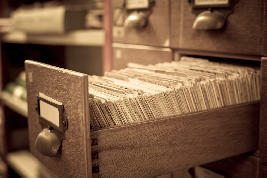 Antique wooden storage boxes in a Archive