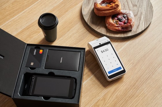 A photo of Zeller's point-of-sale terminal and card for businesses