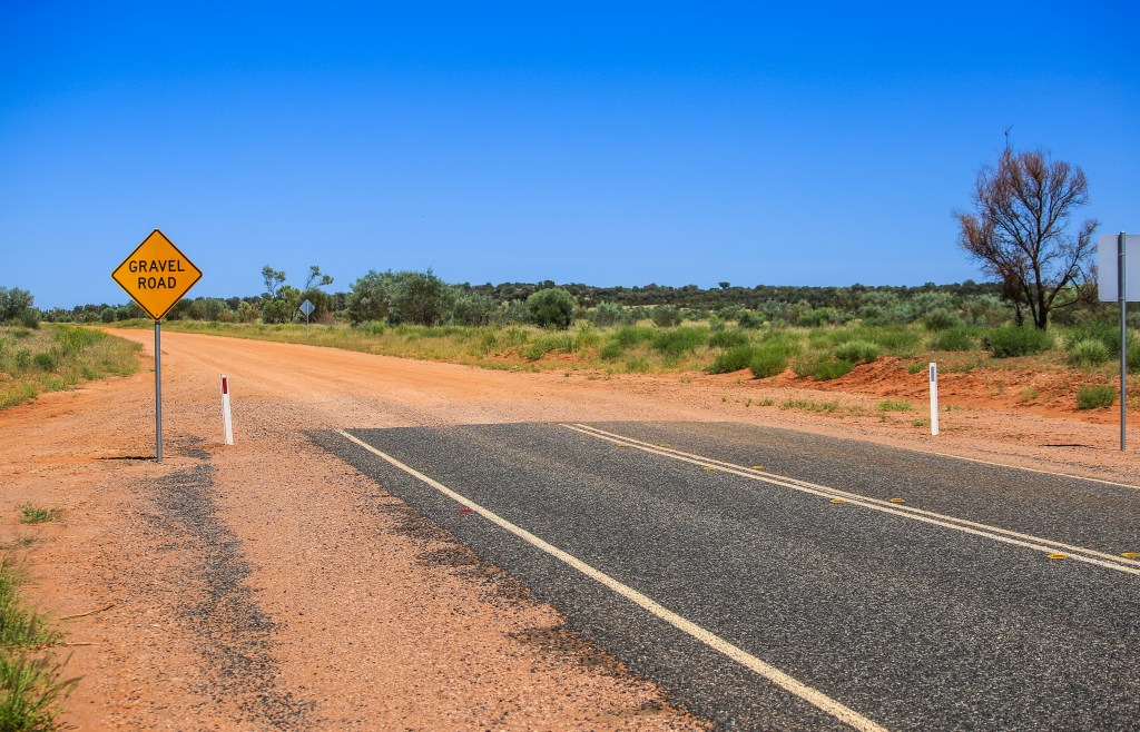 Image of a paved road ending to represent the end of open-source software.