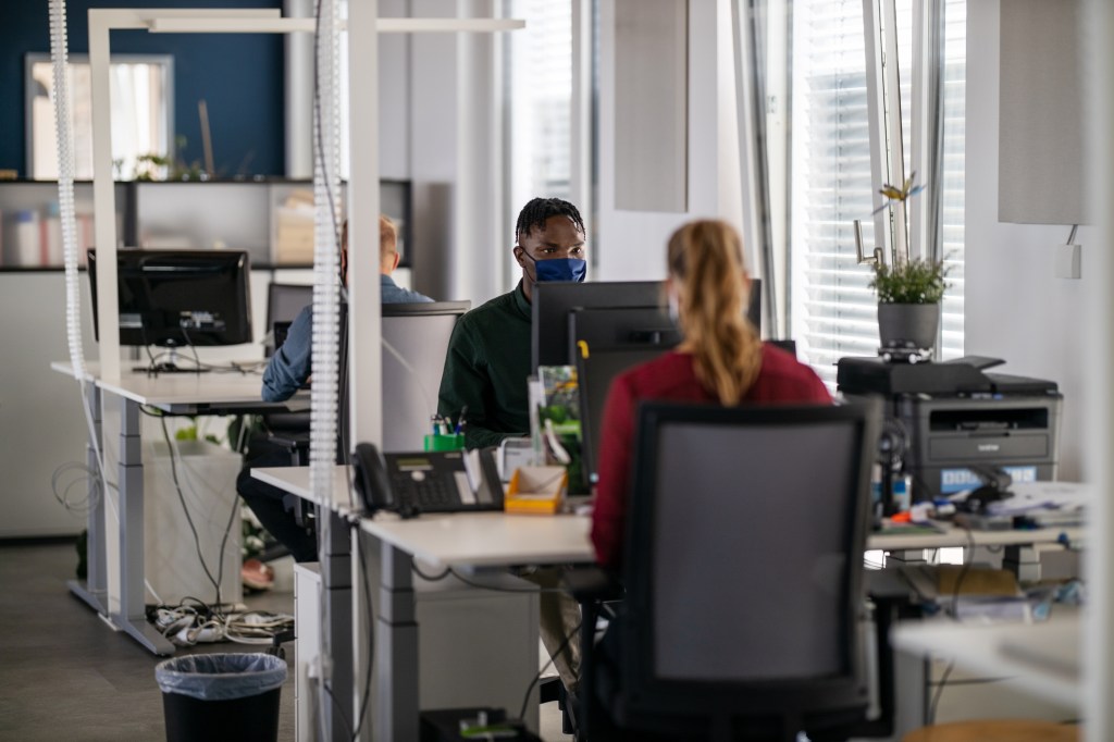 Business people back to work post corona virus lockdown