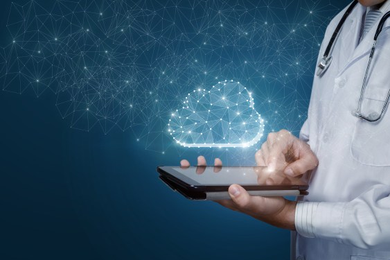 Image of a physician using a phone to access could data.