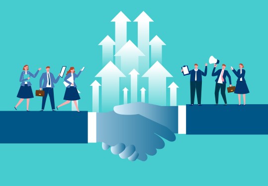 Image of employees celebrating on either side of two hands shaking to represent happy employees after a successful merger or acquisition.