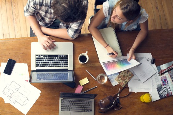 An overhead shot of designers collaborating on project