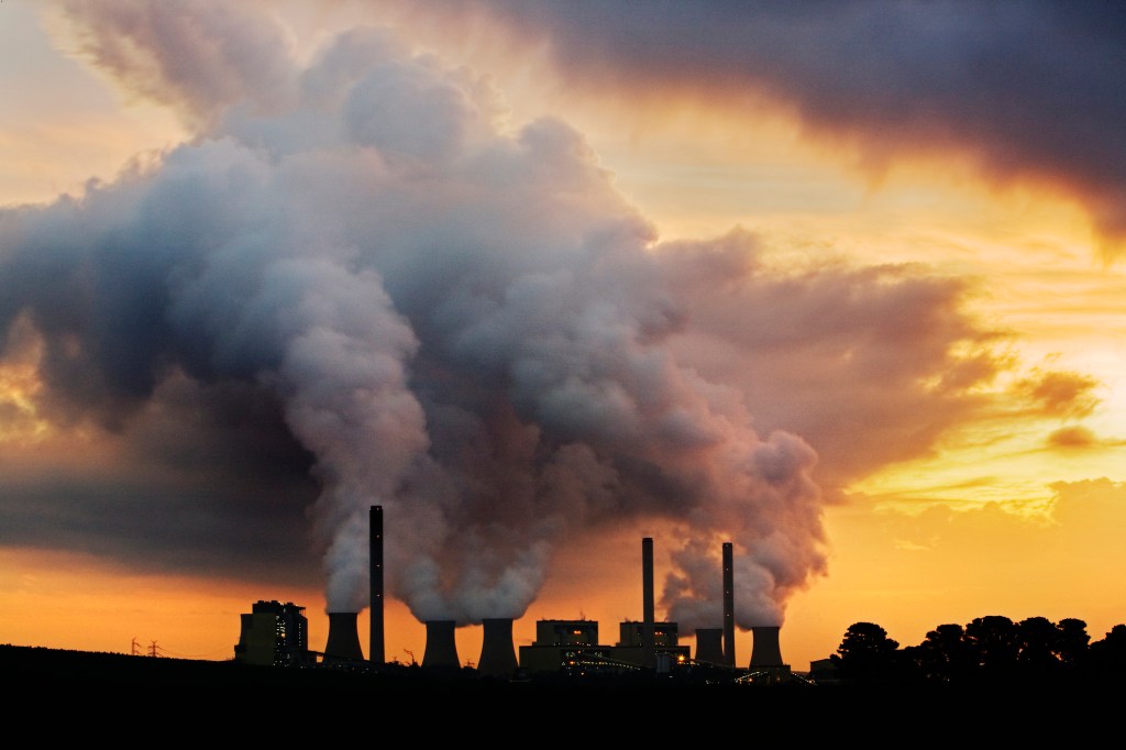 Power station emitting clouds of air pollution into the sky.