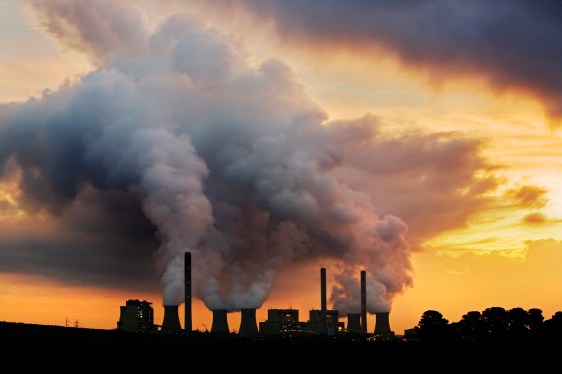 Power station emitting clouds of air pollution into the sky.