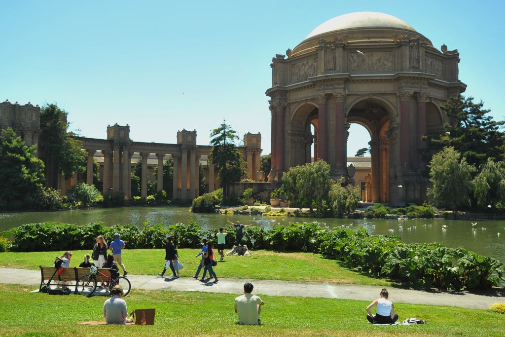 People enjoy their leisure time at the San Francisco Palace of Fine Arts in San Francisco, California, the United States, June 15, 2021. California, the most populous state in the United States, fully reopened its economy amid dropping cases and vaccine eligibility expansion on Tuesday after more than a year of COVID-19 restrictions. (Photo by Liu Yilin/Xinhua via Getty Images)