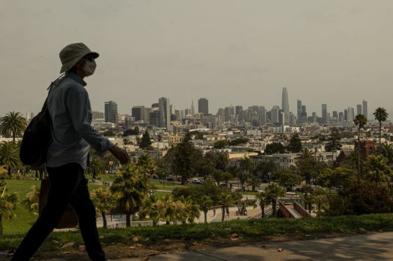 Smoke from wildfires over San Francisco, California, U.S., on Thursday, Aug. 19, 2021. The Bay Area Air Quality Management District issued a Spare the Air alert for Thursday and Friday as smoke from the Northern California wildfires drifts into the region. Photographer: David Paul Morris/Bloomberg via Getty Images