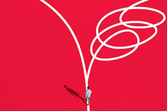 Image of a man walking on a twisty path.