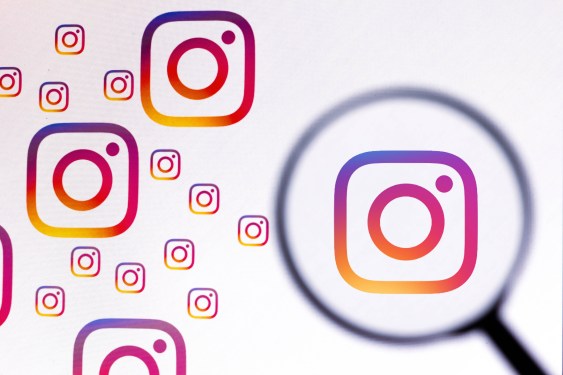 Photo illustration of Instagram logos with one under a microscope.