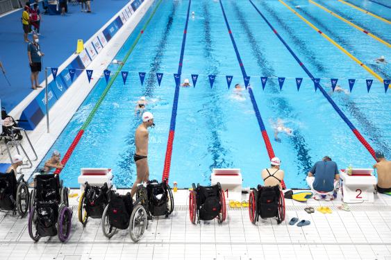 Wheelchairs are pictured poolside during a swim training session ahead of the Tokyo 2020 Paralympic Games on August 23, 2021.