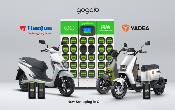 A photo showing electric scooters and a battery swapping station from Gogoro's partnership with Yadea and DCJ