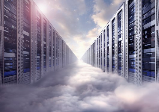 Composite image of computer servers and clouds