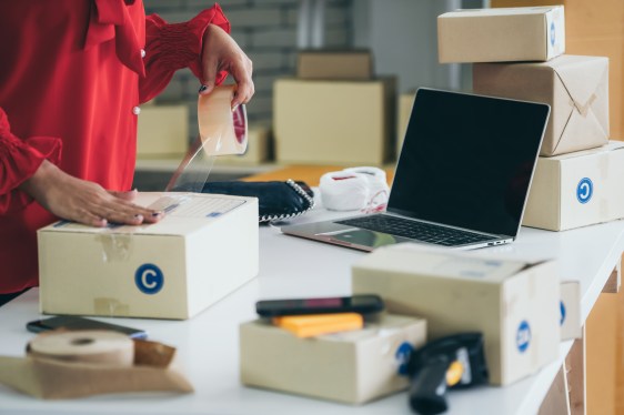 E-commerce seller manages boxes of inventory