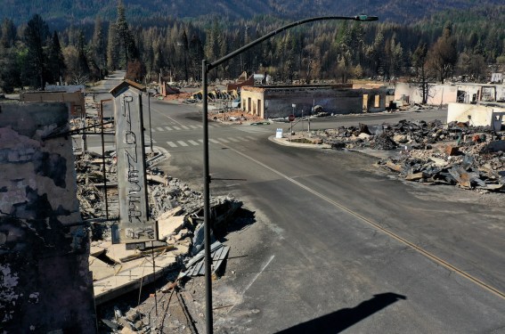 GREENVILLE, CALIFORNIA - SEPTEMBER 24: In an aerial view, the remains of homes and businesses that were destroyed by the Dixie Fire are visible on September 24, 2021 in Greenville, California. The Dixie Fire has burned nearly 1 million acres in five Northern California counties over a two month period. The destructive fire is the second largest fire in state history and has destroyed hundreds of structures. It is currently 94 percent contained. (Photo by Justin Sullivan/Getty Images)