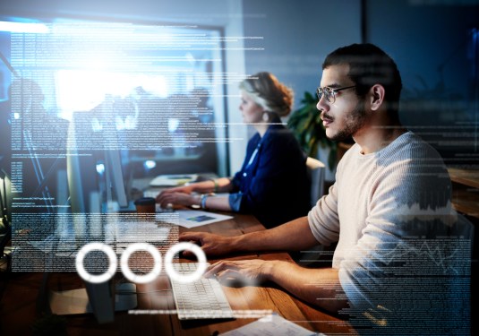 Cropped shot of computer programmers working on new code