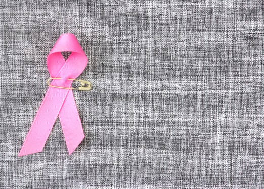 Image of a pink ribbon signifying Breast Cancer Awareness Month.