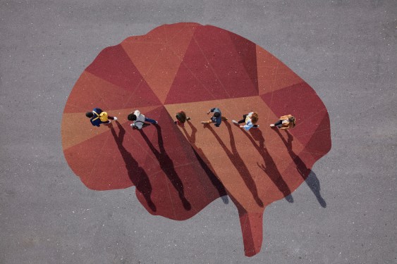 Image of a group of people walking across a painting of a brain in orange and red tones to represent neurodiverse talent.