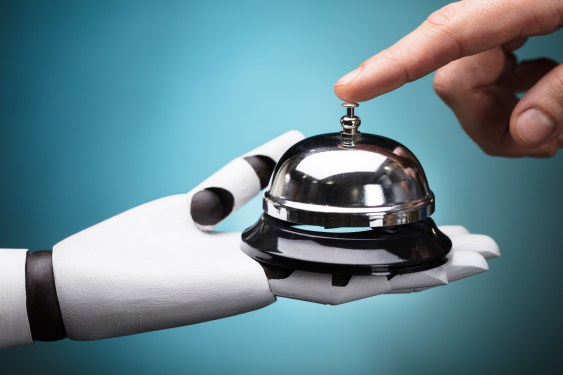 Person Ringing Service Bell Held By Robot