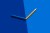 Pencil Cracked into Two Colors on Solid Color Block Background.