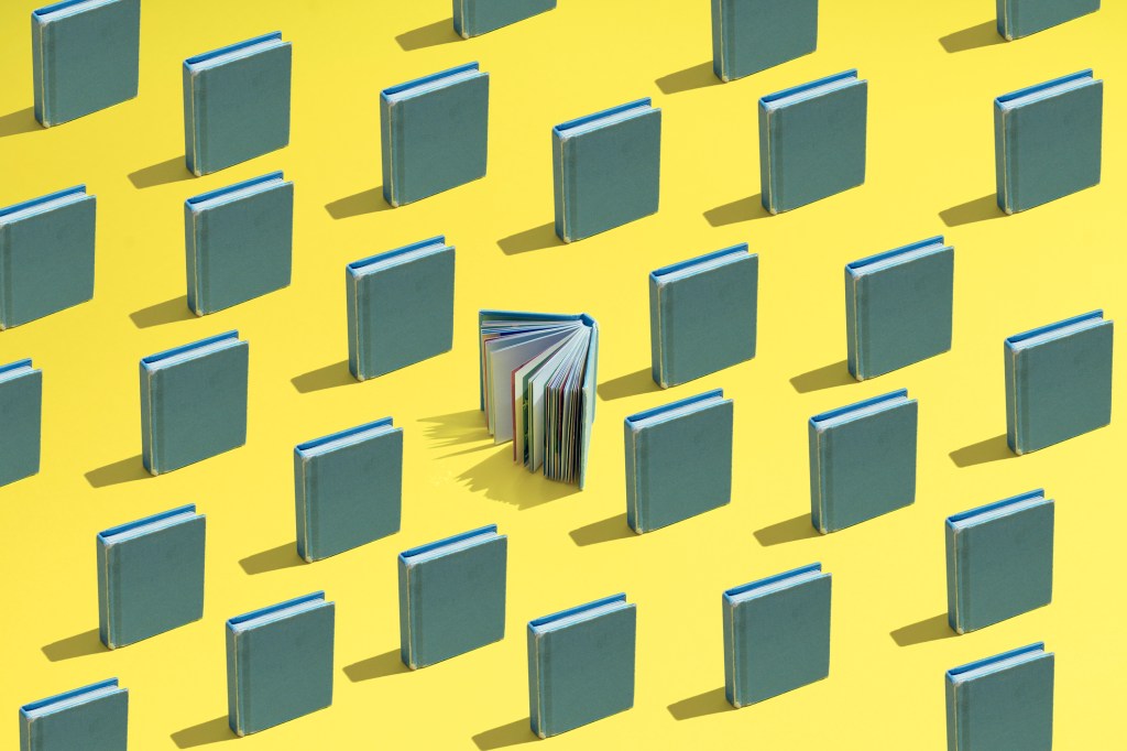 A large group of books where one is opened up