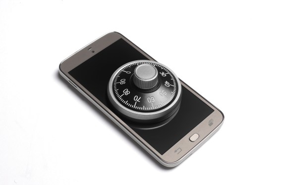 Photo of smartphone with a combination lock on it, used in article about First AML