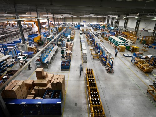 An aerial view of a high tech electrical switchgear factory assembly floor.