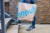 person carrying Gopuff bag up a flight of stairs