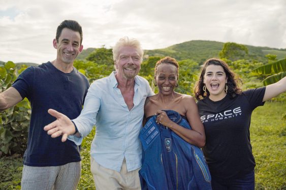 Keisha, third from left, is congratulated by others from Virgin Galactic, Omaze, and Space for Humanity.