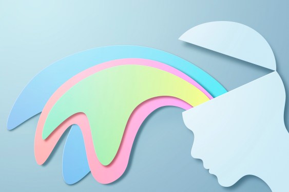Paper cut out design of an open mind of creativity