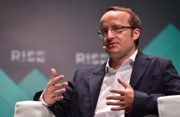 Kris Marszalek, co-founder & CEO of CRYPTO.com, seated onstage at MoneyConf.