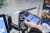 A customer uses Apple pay mobile payment at a contactless payment terminal