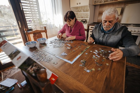 Senior couple enjoying leisure time at home, used in a story about AARP Innovation Labs at CES