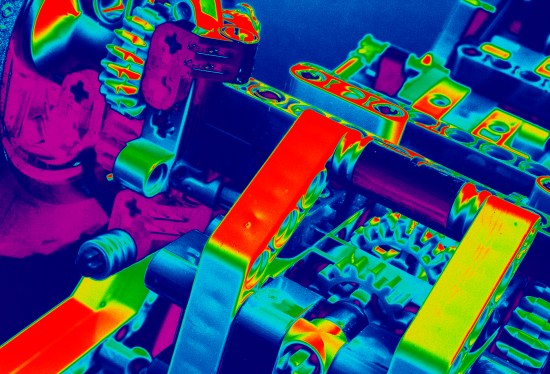 Negative image of bricks, gears, suspension to represent building blocks.