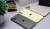 3 smartphones face down on a desk