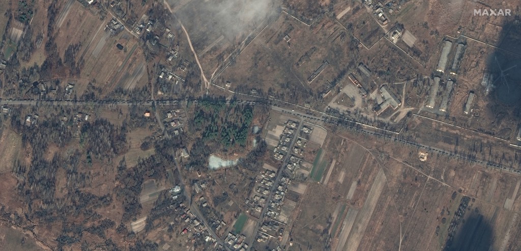A large deployment of Russian ground forces, containing hundreds of military vehicles, are seen in convoy northeast of Ivankiv, Ukraine
