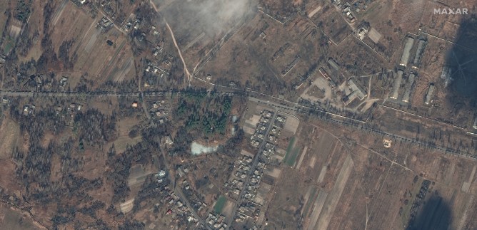 A large deployment of Russian ground forces, containing hundreds of military vehicles, are seen in convoy northeast of Ivankiv, Ukraine