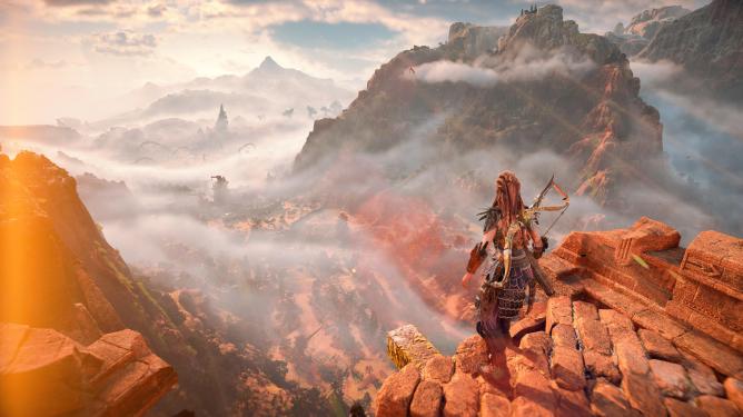 Main character Aloy looks out over a landscape in Horizon: Forbidden West