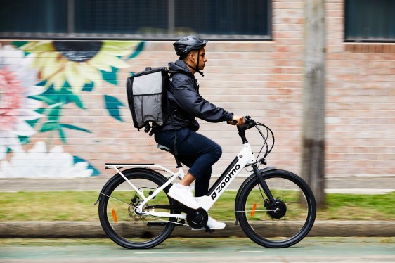 delivery worker on Zoomo e-bike