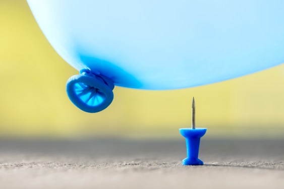 thumbtack below balloon