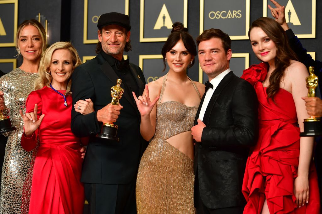 The cast of CODA hold their award for Best Picture in the press room during the 94th Oscars at the Dolby Theatre in Hollywood, California on March 27, 2022. (Photo by Frederic J. Brown / AFP) (Photo by FREDERIC J. BROWN/AFP via Getty Images)