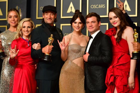 The cast of CODA hold their award for Best Picture in the press room during the 94th Oscars at the Dolby Theatre in Hollywood, California on March 27, 2022. (Photo by Frederic J. Brown / AFP) (Photo by FREDERIC J. BROWN/AFP via Getty Images)