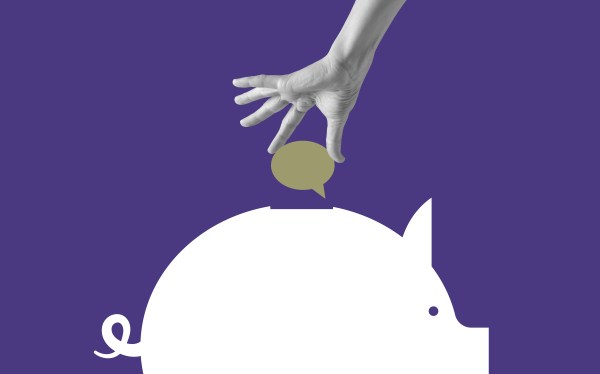 Image of a hand inserting a speech bubble into a white piggy bank against a purple background.