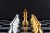 Golden Chess King and Pawn with Silver Colored Pawns on the sides