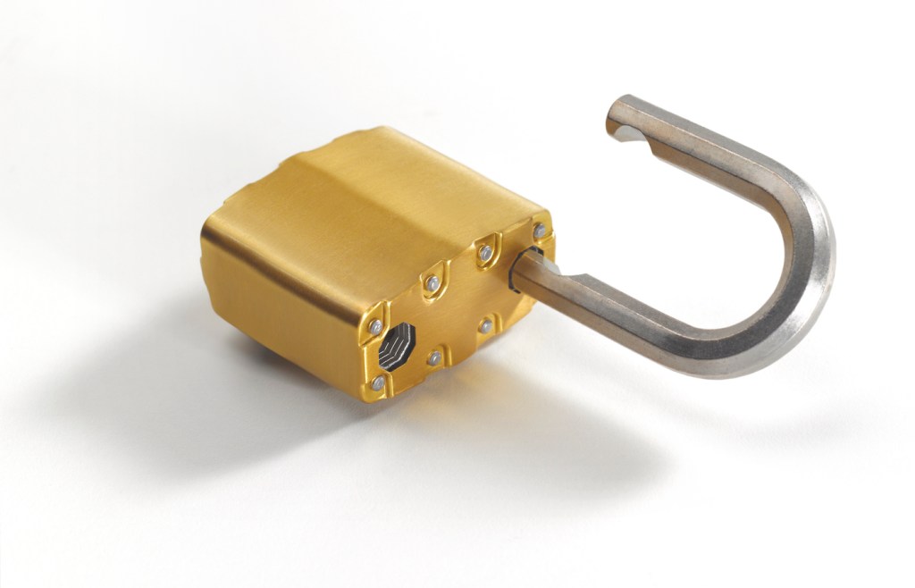 Open gold padlock against a plain white background