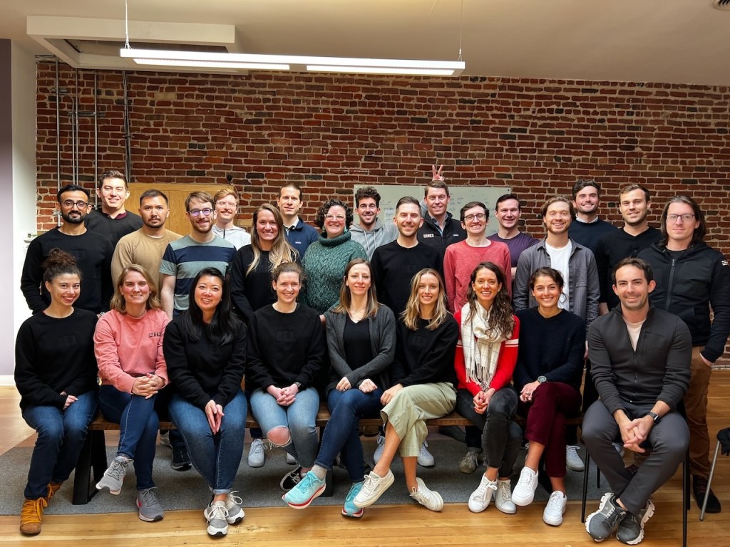 Hex data collaboration startup team photo.