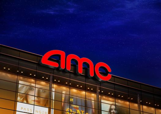 neon AMC theater sign atop building