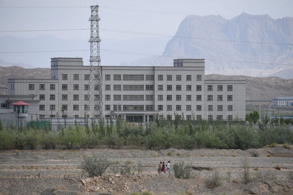 This photo taken on June 2, 2019 shows a facility believed to be a re-education camp where mostly Muslim ethnic minorities are detained, in Artux, north of Kashgar in China's western Xinjiang region. - While Muslims around the world celebrated the end of Ramadan with early morning prayers and festivities this week, the recent destruction of dozens of mosques in Xinjiang highlights the increasing pressure Uighurs and other ethnic minorities face in the heavily-policed region. (Photo by GREG BAKER / AFP) / To go with AFP story China-politics-rights-religion-Xinjiang, FOCUS by Eva Xiao and Pak Yiu (Photo credit should read GREG BAKER/AFP via Getty Images)
