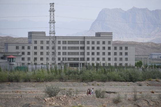 This photo taken on June 2, 2019 shows a facility believed to be a re-education camp where mostly Muslim ethnic minorities are detained, in Artux, north of Kashgar in China's western Xinjiang region. - While Muslims around the world celebrated the end of Ramadan with early morning prayers and festivities this week, the recent destruction of dozens of mosques in Xinjiang highlights the increasing pressure Uighurs and other ethnic minorities face in the heavily-policed region. (Photo by GREG BAKER / AFP) / To go with AFP story China-politics-rights-religion-Xinjiang, FOCUS by Eva Xiao and Pak Yiu (Photo credit should read GREG BAKER/AFP via Getty Images)