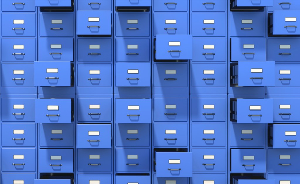 An illustration of stacks of blue filing cabinets, some drawers opened